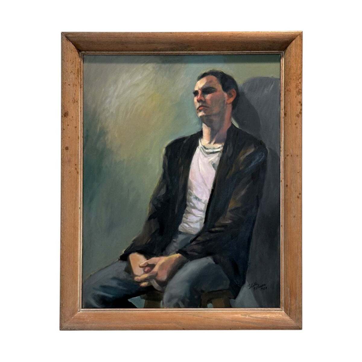 Reserved SSS Portrait of a Seated Man